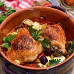 Chicken and vegetables cooking in a skillet for Mediterranean Chicken Recipe