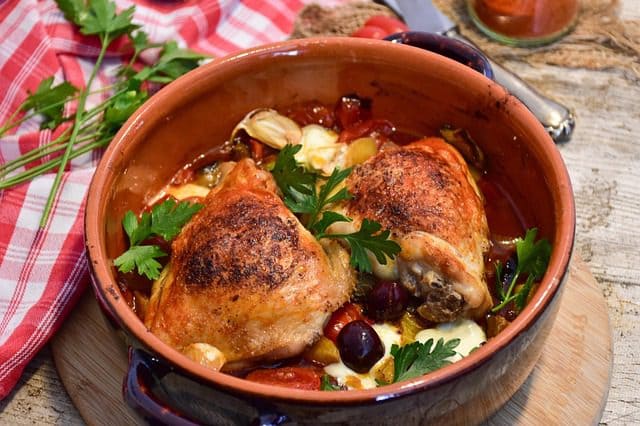 Chicken and vegetables cooking in a skillet for Mediterranean Chicken Recipe